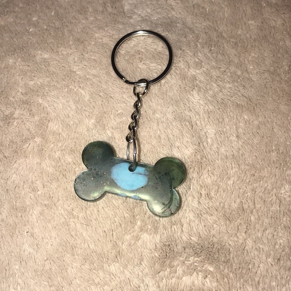 Custom epoxy mini bone 🦴 keychain green with blue dots - Picture 2 of 3